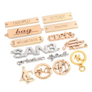 Label dompet logam