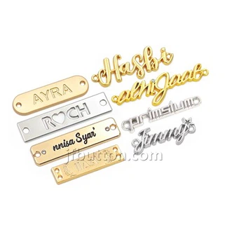 Pakaian Logo Logam